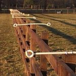 post and rail fence with double sided electric wire