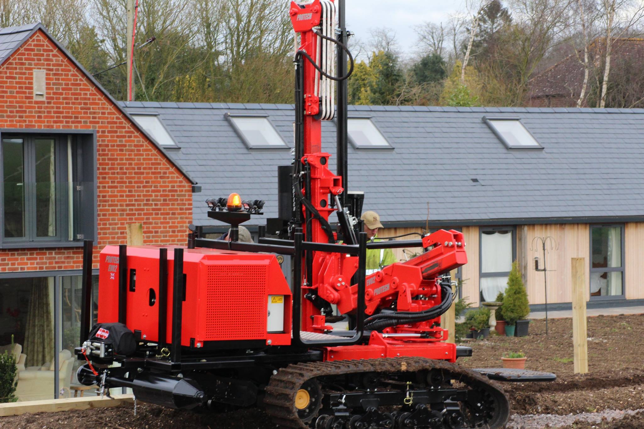 Protech Evo2 tracked selfpropelled post driver. Conservation Contractors