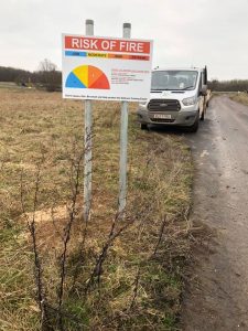 Erecting 38 warning signs around Salisbury Plain 