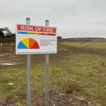 Erecting 38 warning signs around Salisbury Plain