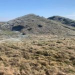 covering an ancient burial site with chain link mesh