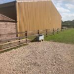 Plastic Fence on Creosote posts for equestrian yard