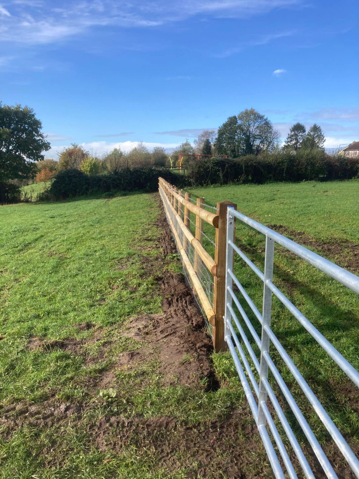 Conserve Rails 200m of post and 3-rail fence with netting - Conservation Contractors