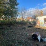 Clearing brambles from a site in Bristol