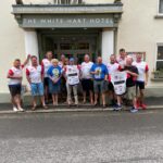 The Unlikely Cyclists outside The White Hart